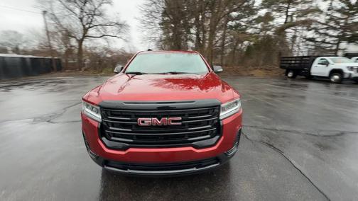 Red 2023 GMC Acadia SLE