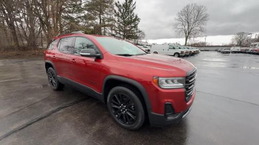 Red 2023 GMC Acadia SLE