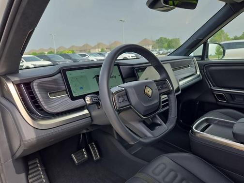 White 2023 Rivian R1S Adventure Quad Motor Large Pack