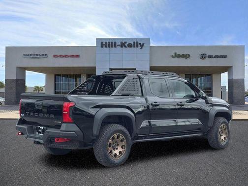 Black 2025 Toyota Tacoma Hybrid Trailhunter