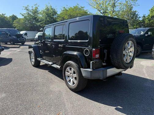 Black 2015 Jeep Wrangler Unlimited Sahara