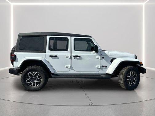 bright white clearcoat 2026 Jeep Wrangler 4-Door Sahara 4x4
