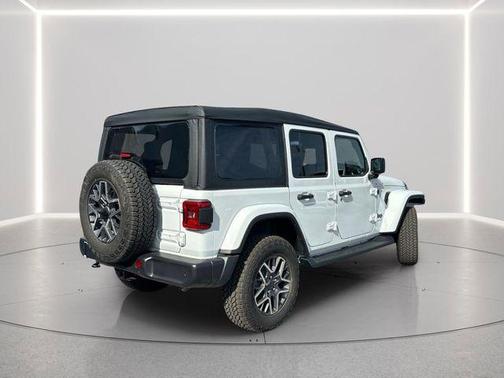 bright white clearcoat 2026 Jeep Wrangler 4-Door Sahara 4x4