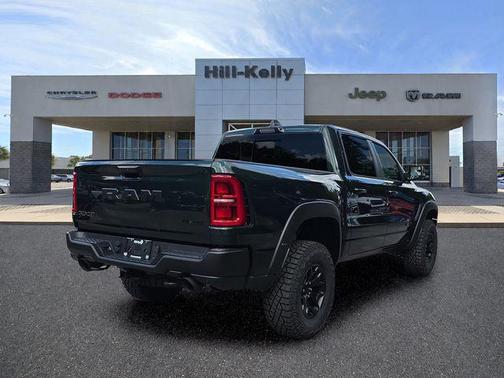 Serrano Green Metallic 2026 RAM 1500 RHO Crew Cab 4x4 5'7' Box