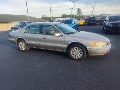 Light Parchment Gold Clearcoat Metallic 2000 Lincoln Continental 4dr Sdn