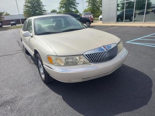 GOLD 1999 Lincoln Continental 4dr Sdn