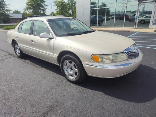 GOLD 1999 Lincoln Continental 4dr Sdn