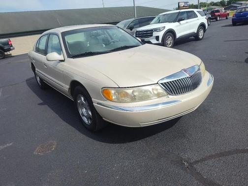 GOLD 1999 Lincoln Continental 4dr Sdn