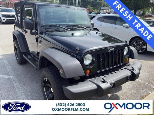Black 2012 Jeep Wrangler Sport
