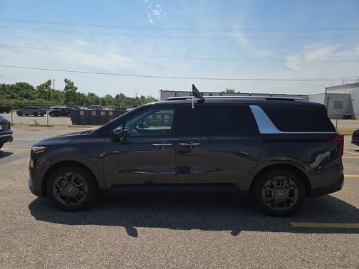 Aurora Black Pearl 2025 Kia Carnival Hybrid EX