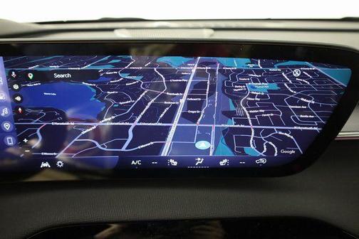 stone metallic 2026 Buick Enclave Sport Touring