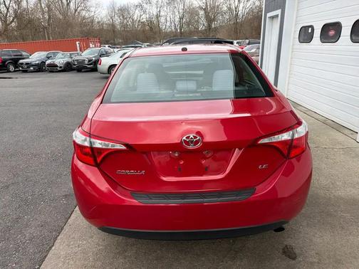 Barcelona Red Metallic 2015 Toyota Corolla LE Plus