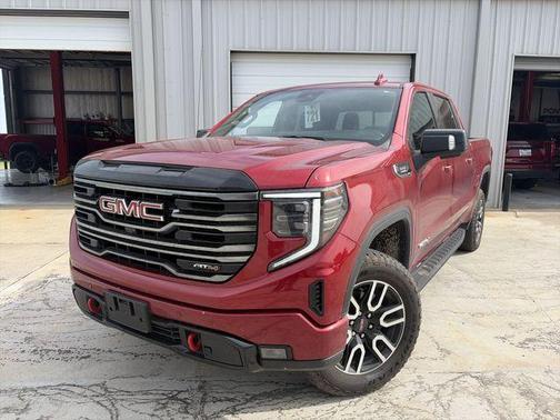Volcanic Red 2026 GMC Sierra 1500 AT4