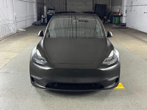 Solid Black 2024 Tesla Model Y Performance