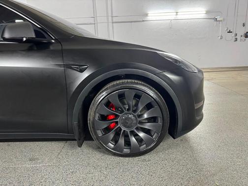 Solid Black 2024 Tesla Model Y Performance