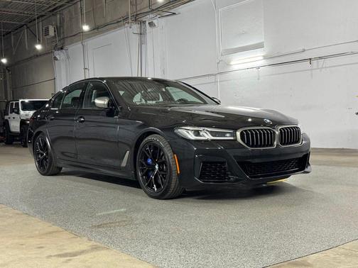 Black Sapphire Metallic 2023 BMW M550 i xDrive