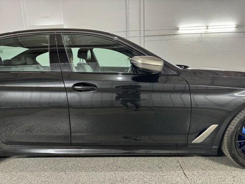 Black Sapphire Metallic 2023 BMW M550 i xDrive