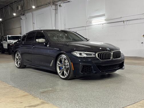 Carbon Black Metallic 2023 BMW M550 i xDrive