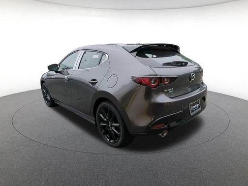 Machine Gray Metallic 2026 Mazda Mazda3 AWD w/Premium Package