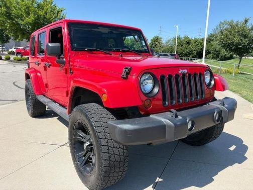 Flame Red Clearcoat 2011 Jeep Wrangler Unlimited Sahara