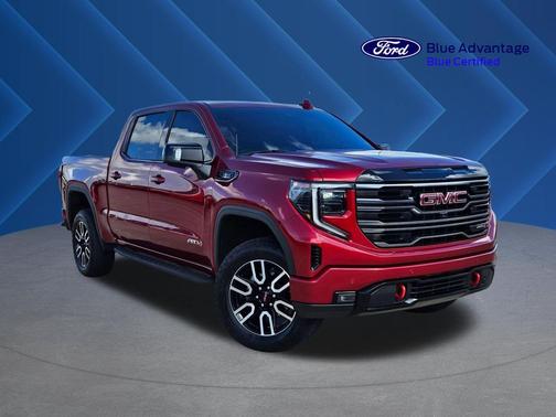 Volcanic Red Tintcoat 2025 GMC Sierra 1500 AT4