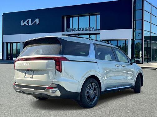 Ivory Silver 2026 Kia Carnival SX