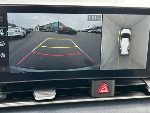 Ivory Silver 2026 Kia Carnival Hybrid SX