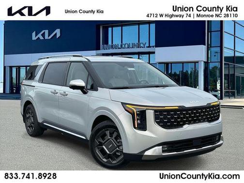 Ivory Silver 2026 Kia Carnival Hybrid SX