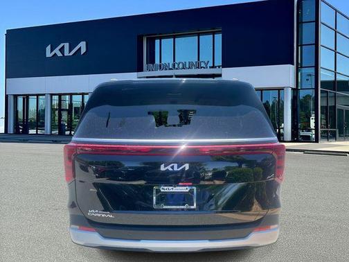 Aurora Black Pearl 2026 Kia Carnival EX