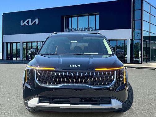 Aurora Black Pearl 2026 Kia Carnival Hybrid EX