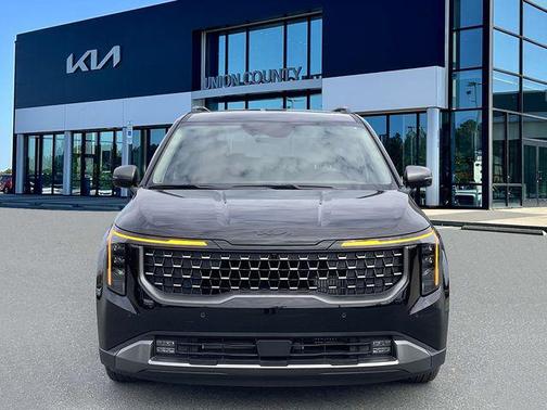 Aurora Black Pearl 2026 Kia Carnival Hybrid SX