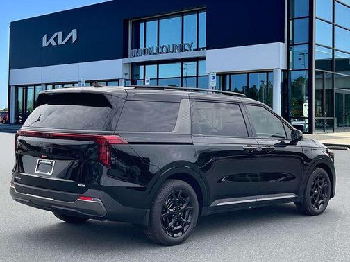Aurora Black Pearl 2026 Kia Carnival Hybrid SX