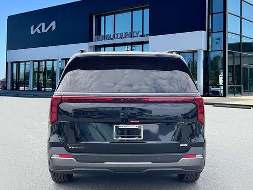 Aurora Black Pearl 2026 Kia Carnival Hybrid SX