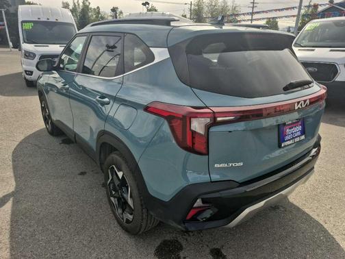 Blue 2024 Kia Seltos EX