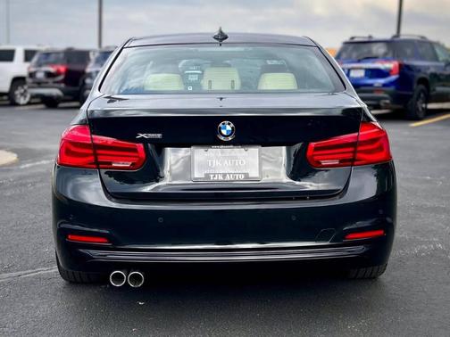 Black 2018 BMW 330 i xDrive