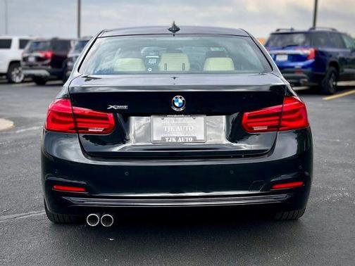 Black 2018 BMW 330 i xDrive