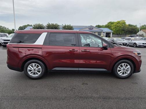 Red 2024 Kia Carnival LX
