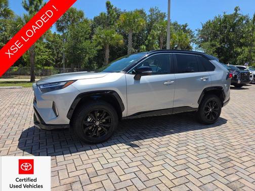 Silver Sky Metallic/Midnight Black Metallic 2023 Toyota RAV4 Hybrid SE