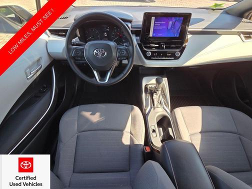 Midnight Black Metallic 2025 Toyota Corolla Hybrid SE