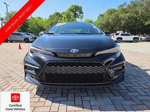 Midnight Black Metallic 2025 Toyota Corolla Hybrid SE