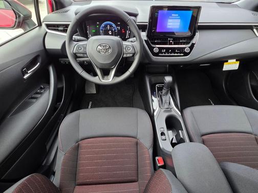 Ruby Flare Pearl 2026 Toyota Corolla Hybrid SE