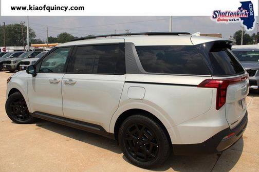 Ivory Silver 2026 Kia Carnival Hybrid SX