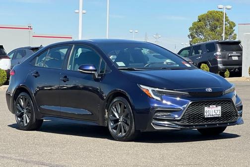Blueprint/Midnight Black Metallic 2025 Toyota Corolla SE