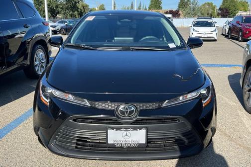 Midnight Black Metallic 2025 Toyota Corolla LE