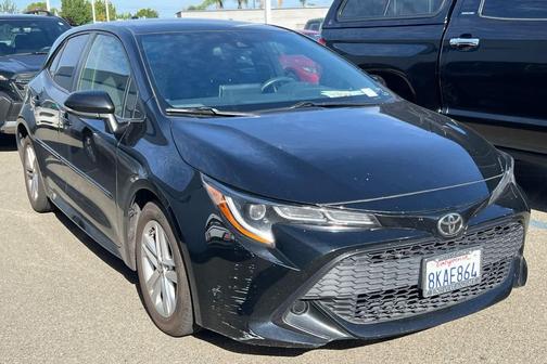 Midnight Black Metallic 2019 Toyota Corolla Hatchback SE