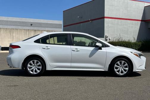 Wind Chill Pearl 2025 Toyota Corolla Hybrid LE