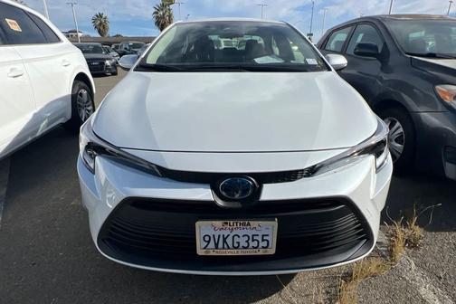 Wind Chill Pearl 2025 Toyota Corolla Hybrid LE