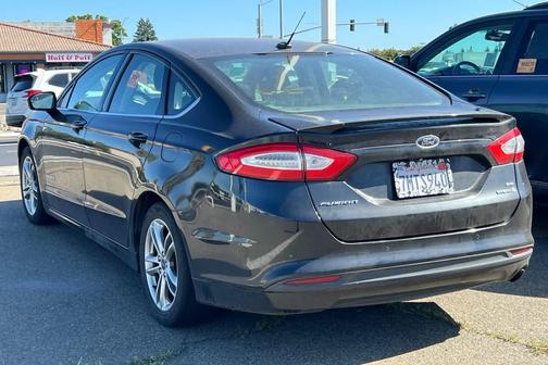 Ruby Red Tinted Clearcoat 2015 Ford Fusion Hybrid SE