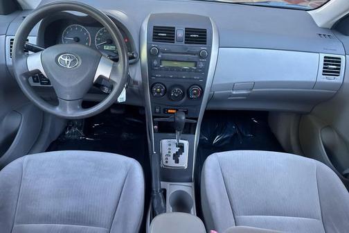 Super White 2010 Toyota Corolla LE