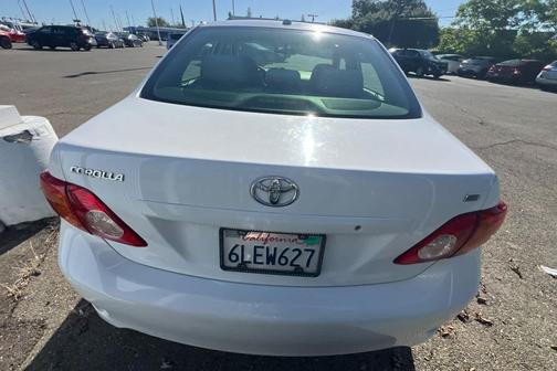 Super White 2010 Toyota Corolla LE